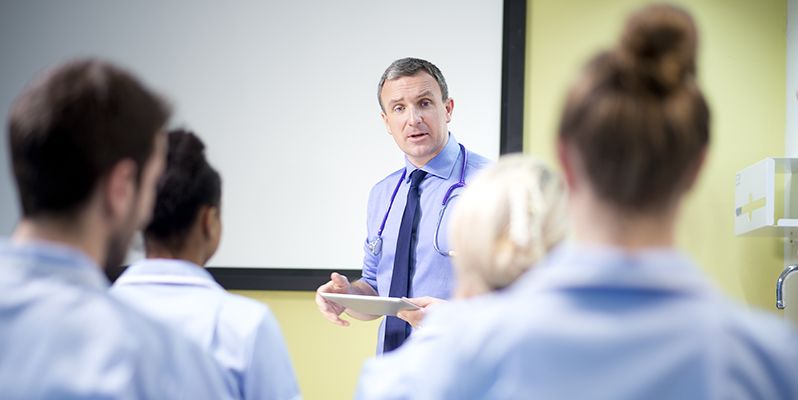 Doctor in class with students